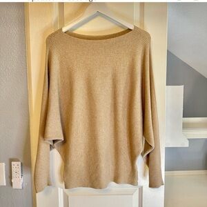 Slouchy batwing boatneck sweater in a tan cream color